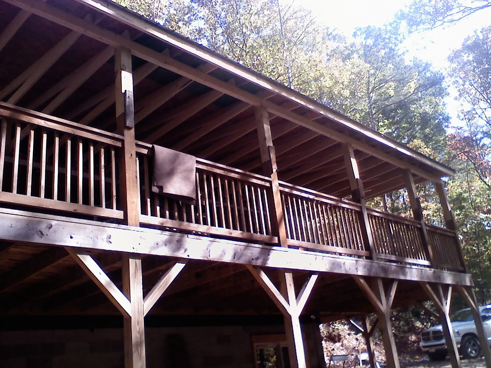 Timber framing under a new elevated porch and deck — Roof Leak Repair in Buffalo Center by Roofing Brothers